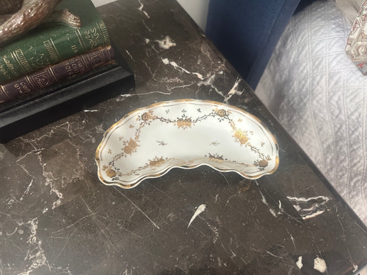 Fish bone dish with floral design in gold