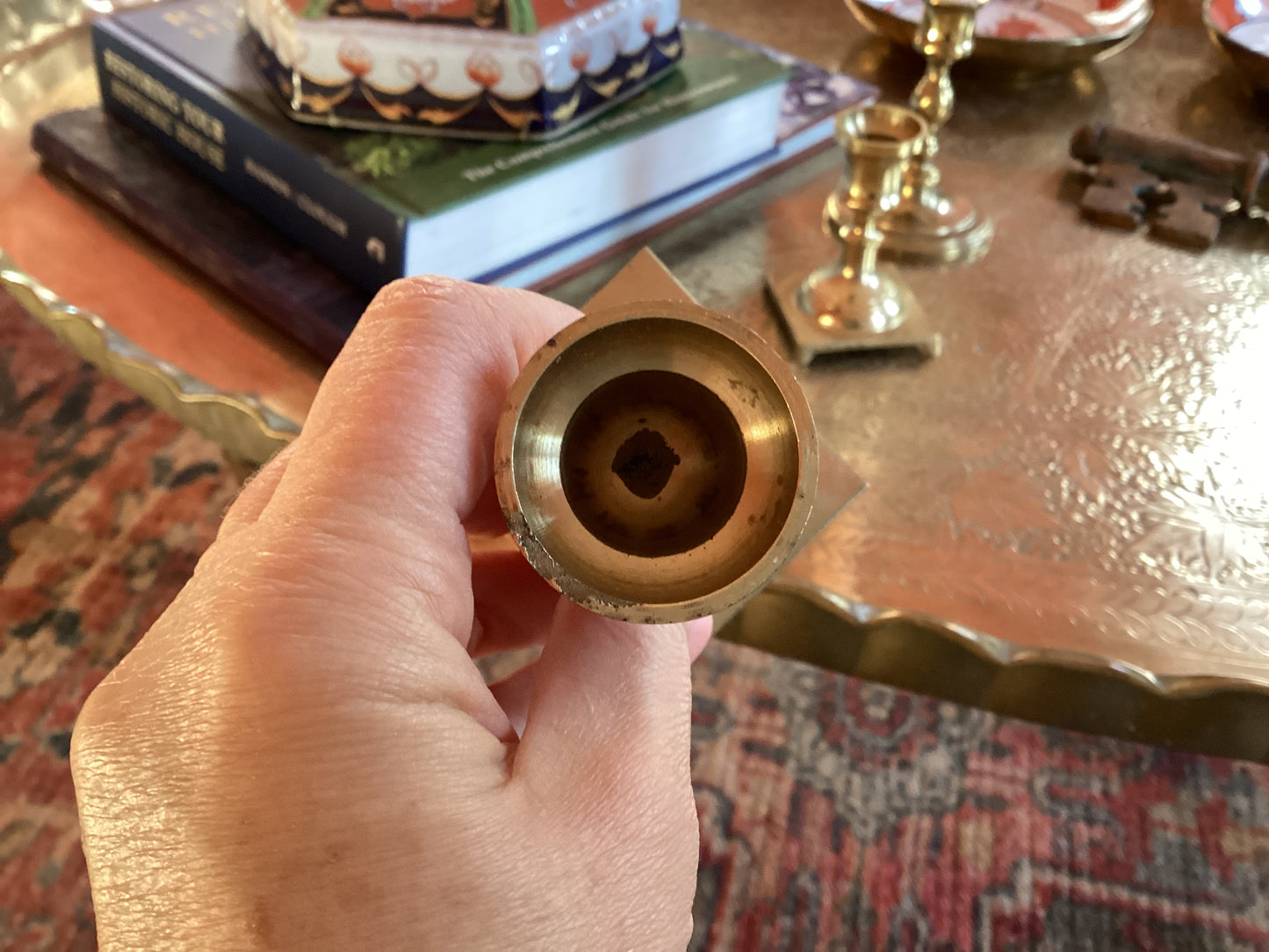 A pair of pure brass candlesticks