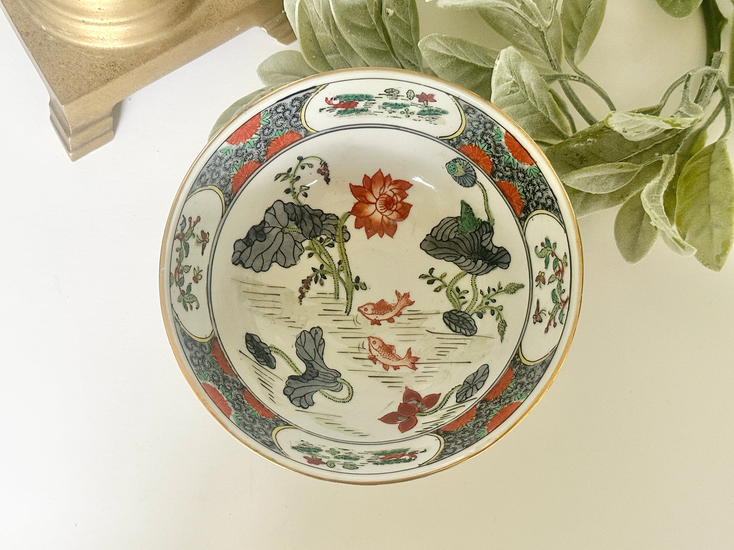 Decorative Asian bowl with Koi motif and gold rim