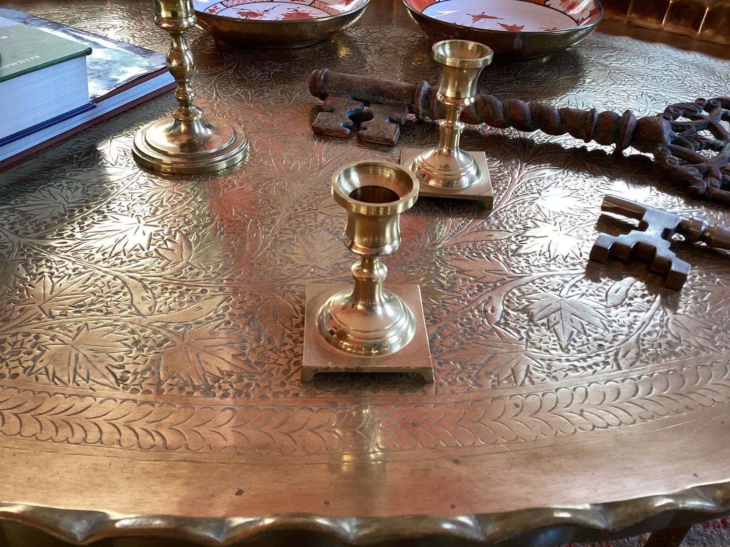 A pair of pure brass candlesticks