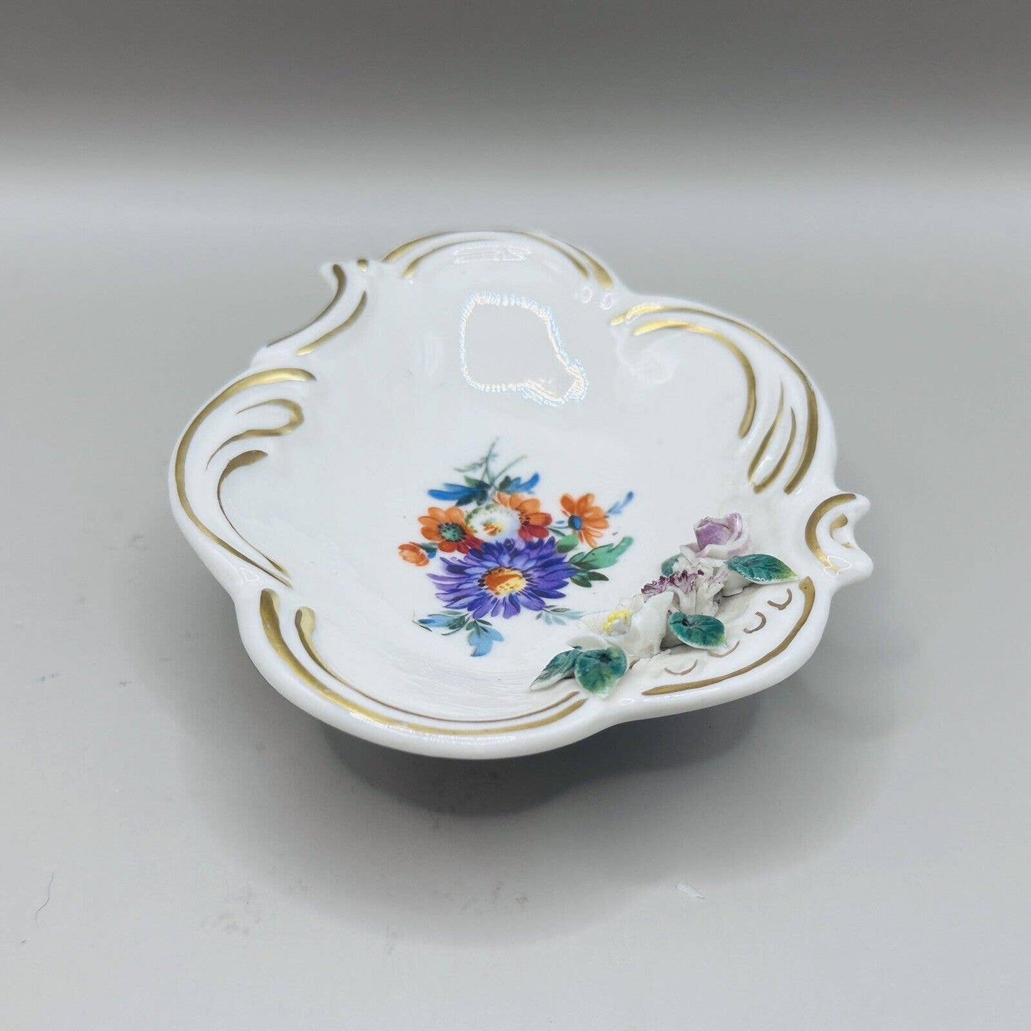 VINATAGE PORCELAIN TRINKET DISH WITH FLOWERS ON ONE SIDE GOLD TRIM Germany