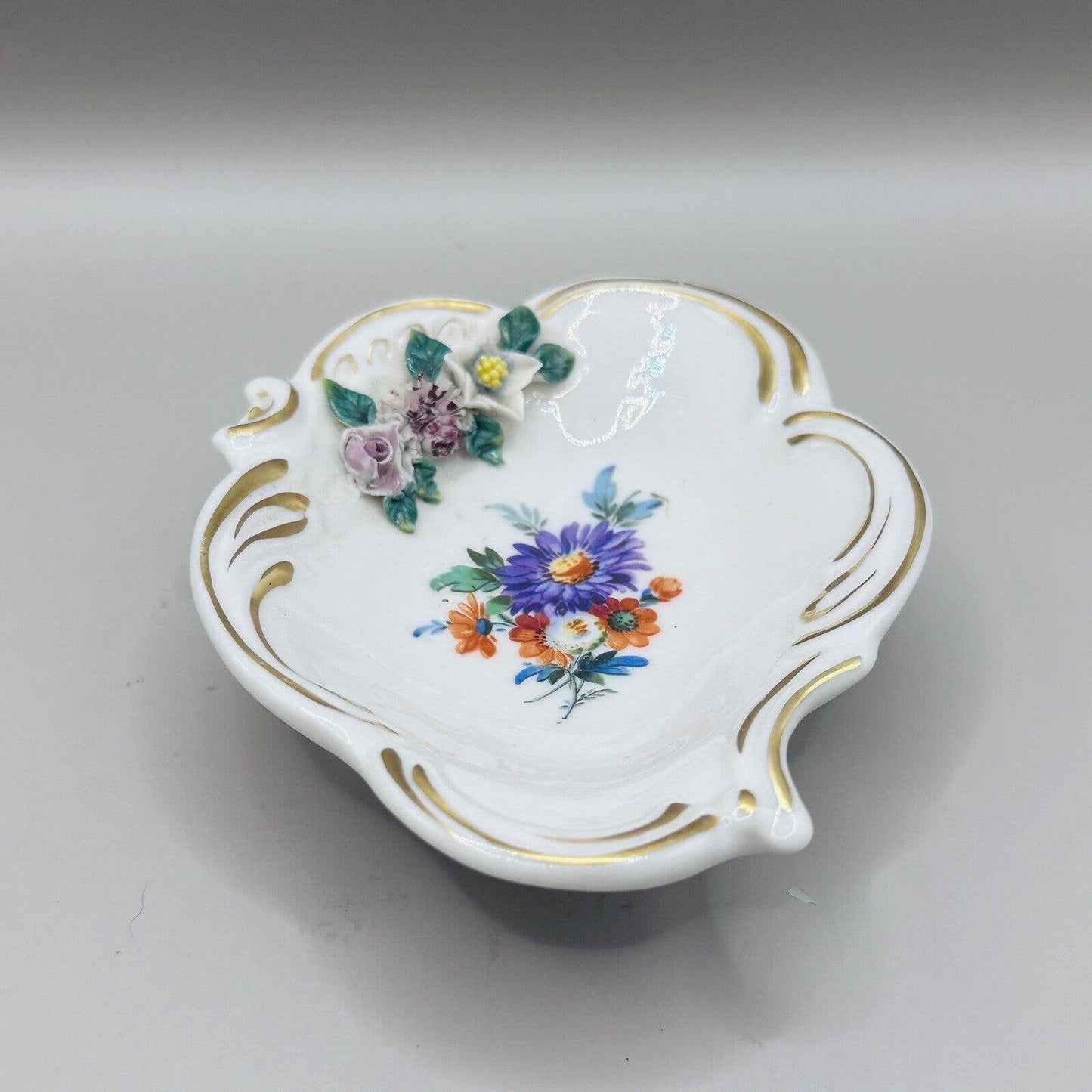 VINATAGE PORCELAIN TRINKET DISH WITH FLOWERS ON ONE SIDE GOLD TRIM Germany