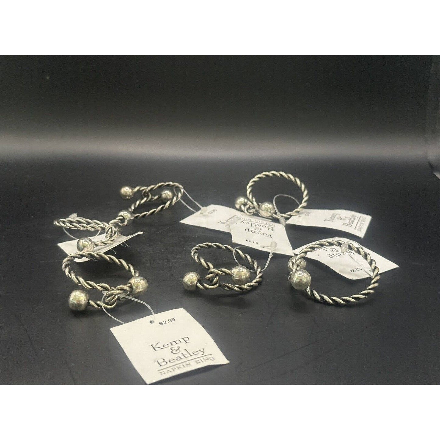 Silver Tone Napkin Ring Twist Brand New set of 6